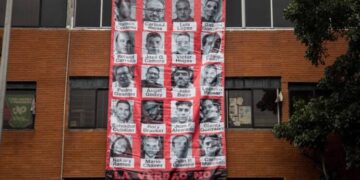 CNP exige investigación tras vandalismo contra gigantografía en su sede en Caracas